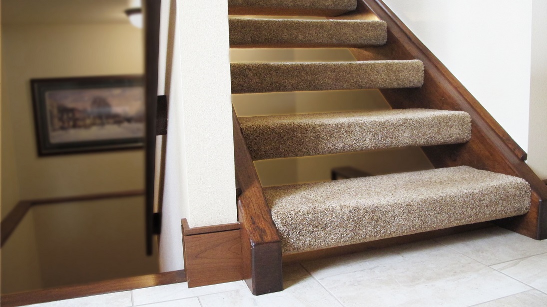 open risers stairs staircase stairwell natural wood stain shaw tuftex sterling heights sun kiss carpet 