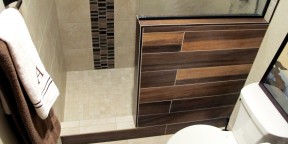 guest bathroom walk in shower shower pony wall glass stainless mosaic tile plank 6x36 Daltile Acacia Valley Ridge Kensington Beige Glazio Corrugated Series Ginger Clove