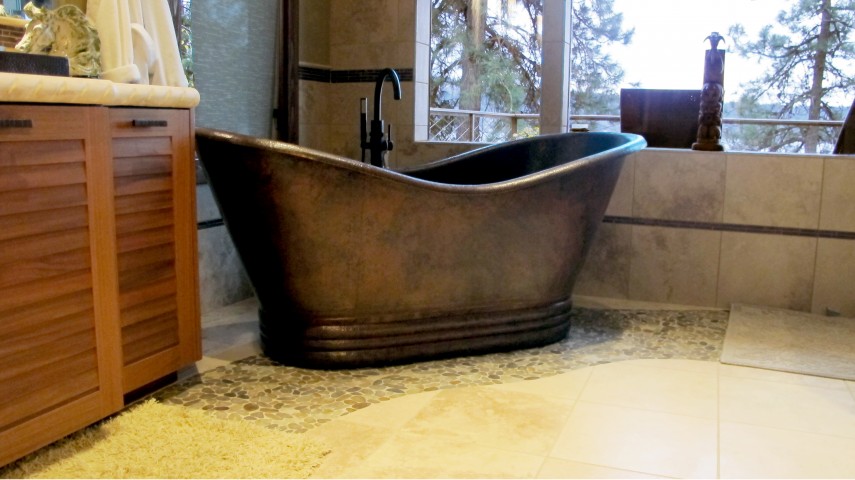 Master bathroom with copper tub rivera pebble travertine floors