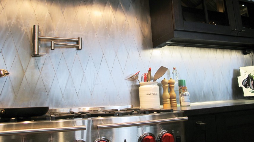 Kitchen gas range with metal backsplash refurbished