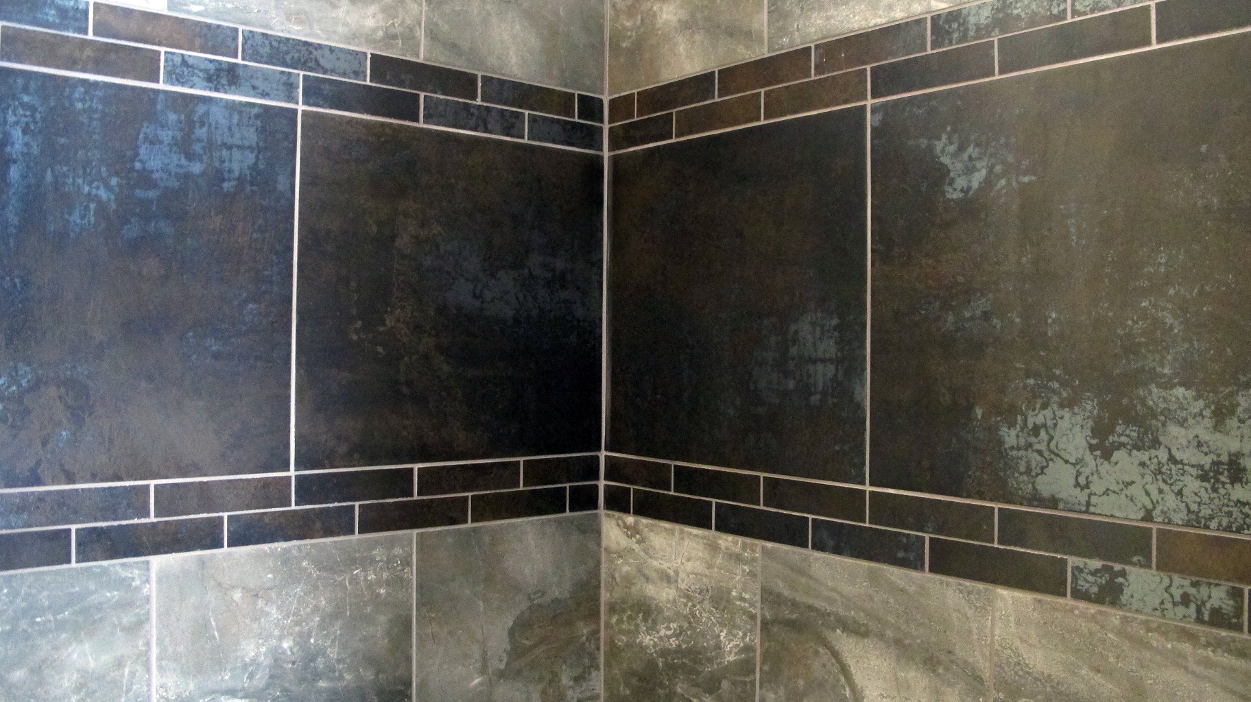 Shower wall tile American olean danya Basin 12x12 field statements metallic antares nero  decorative band large porcelain grey brown modern rustic castle