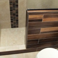 guest bathroom walk in shower shower pony wall glass stainless mosaic tile plank 6x36 Daltile Acacia Valley Ridge Kensington Beige Glazio Corrugated Series Ginger Clove