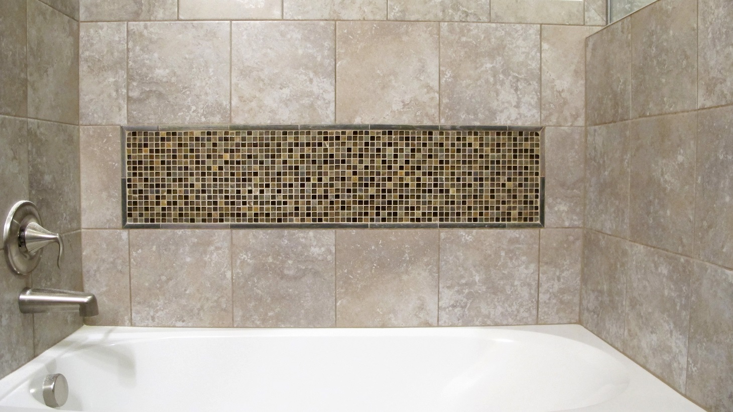 Guest Bathroom slide in bath tub with tile surround and decorative mosaic insert slate glass mix brushed nickel Sandalo Castillian Gray Daltile Stone Radiance Saddle Blend Customs Grout Light Smoke