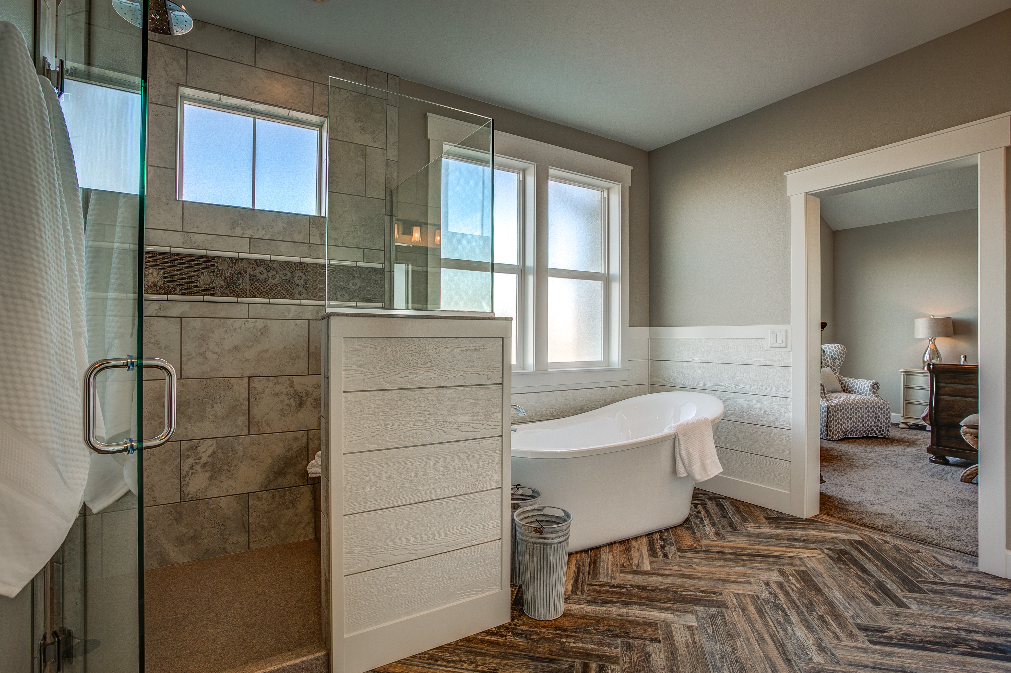 Master Bathroom Walk-in Shower with Wood plank herringbone tile floor